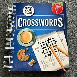 Brand new crossword puzzle book. Includes 250 puzzles with solutions .